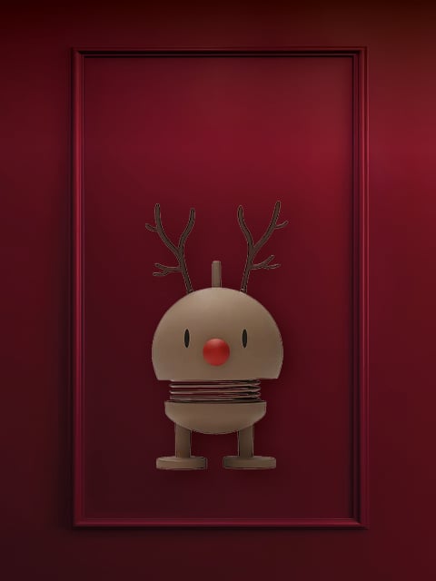 Auf rotem Untergrund ist ein Paar beige Fäustlinge mit weißem Pelzbesatz abgebildet. Darüber steht in weißer Schrift der Text „KLEINE GESCHENKE“.