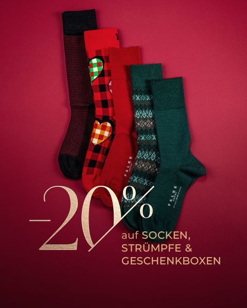 Fünf Paar bunt gemusterte Socken sind auf einem roten Hintergrund mit Text angeordnet: "-20% auf Socken, Strümpfe & Geschenkboxen.